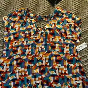 women’s size 1x brand new w/tags top,loose fitting